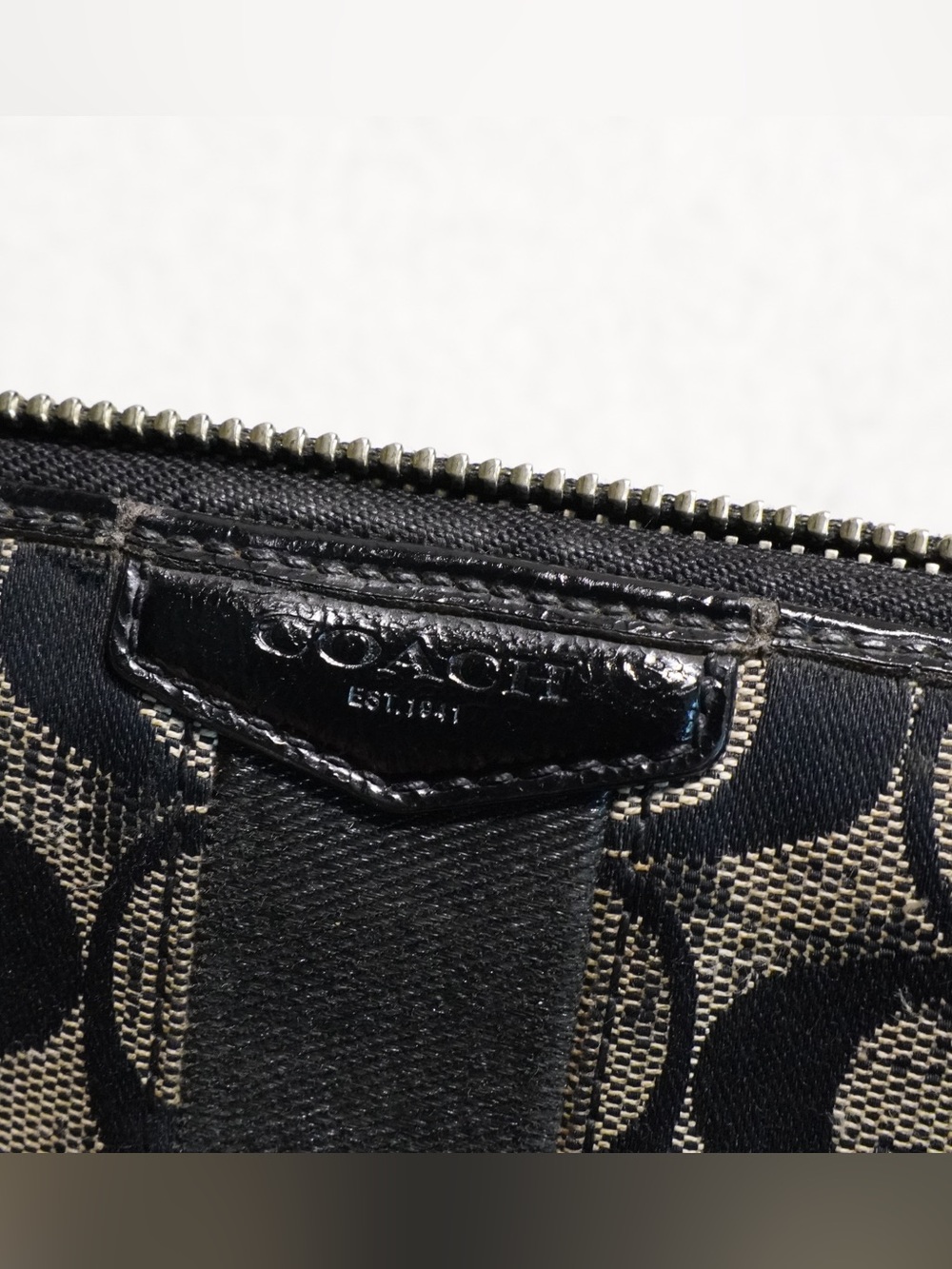Coach Black and Tan Signature Canvas Zip Around long Wallet